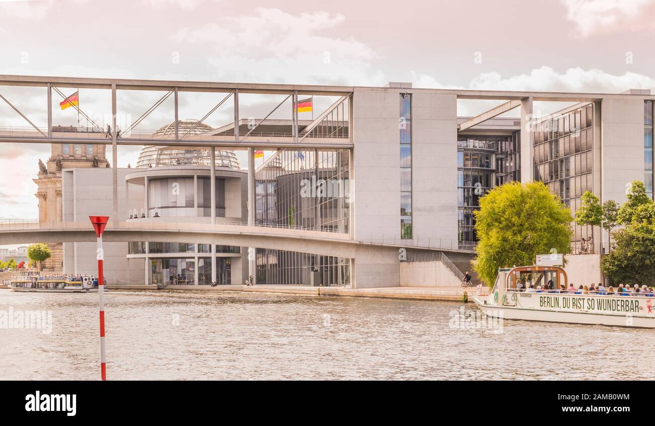 sightseeing boat in front of marie-elisabeth-lueders-haus, reichstag building in background Stock Photo