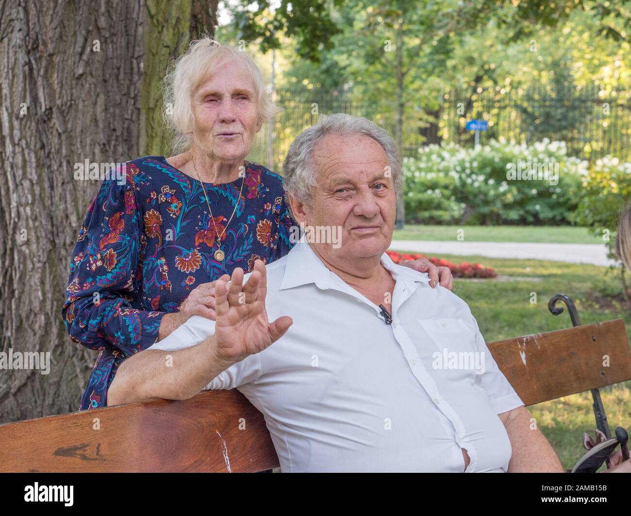 Happy elderly man and woman in the park. Seniority concept Stock Photo