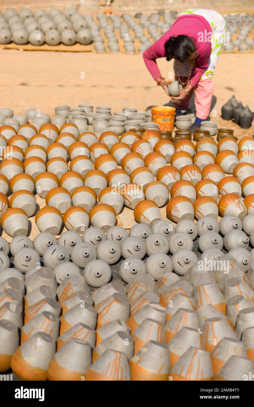 Pottery jars drying in the sun, Bhaktapur, Nepal Stock Photo