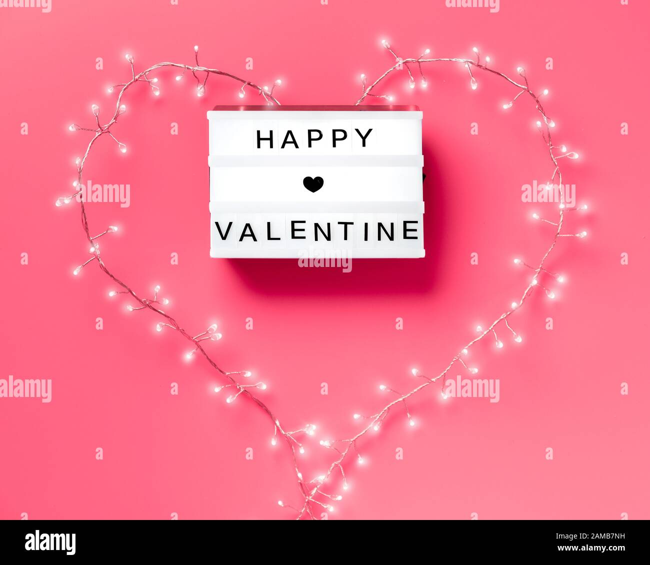 Valentine flat lay, top view on pink background. Lightbox with text ...