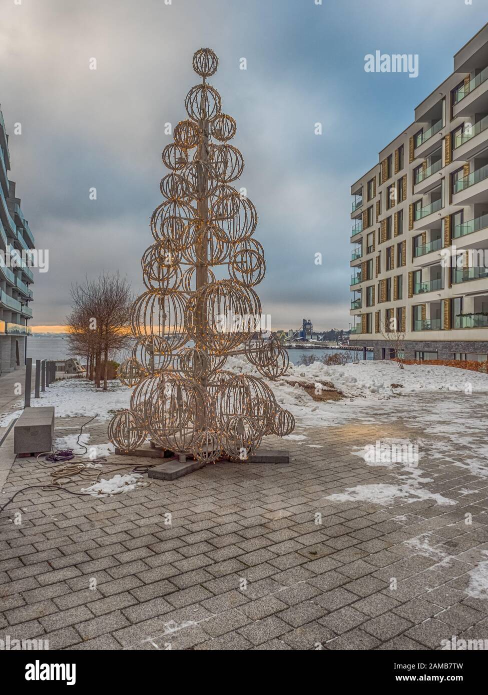 Oslo, Norway - December 20, 2018: Big, white Christmas tree waiting for a  Christmas time in Oslo next to the fjord. In the background modern building  Stock Photo - Alamy