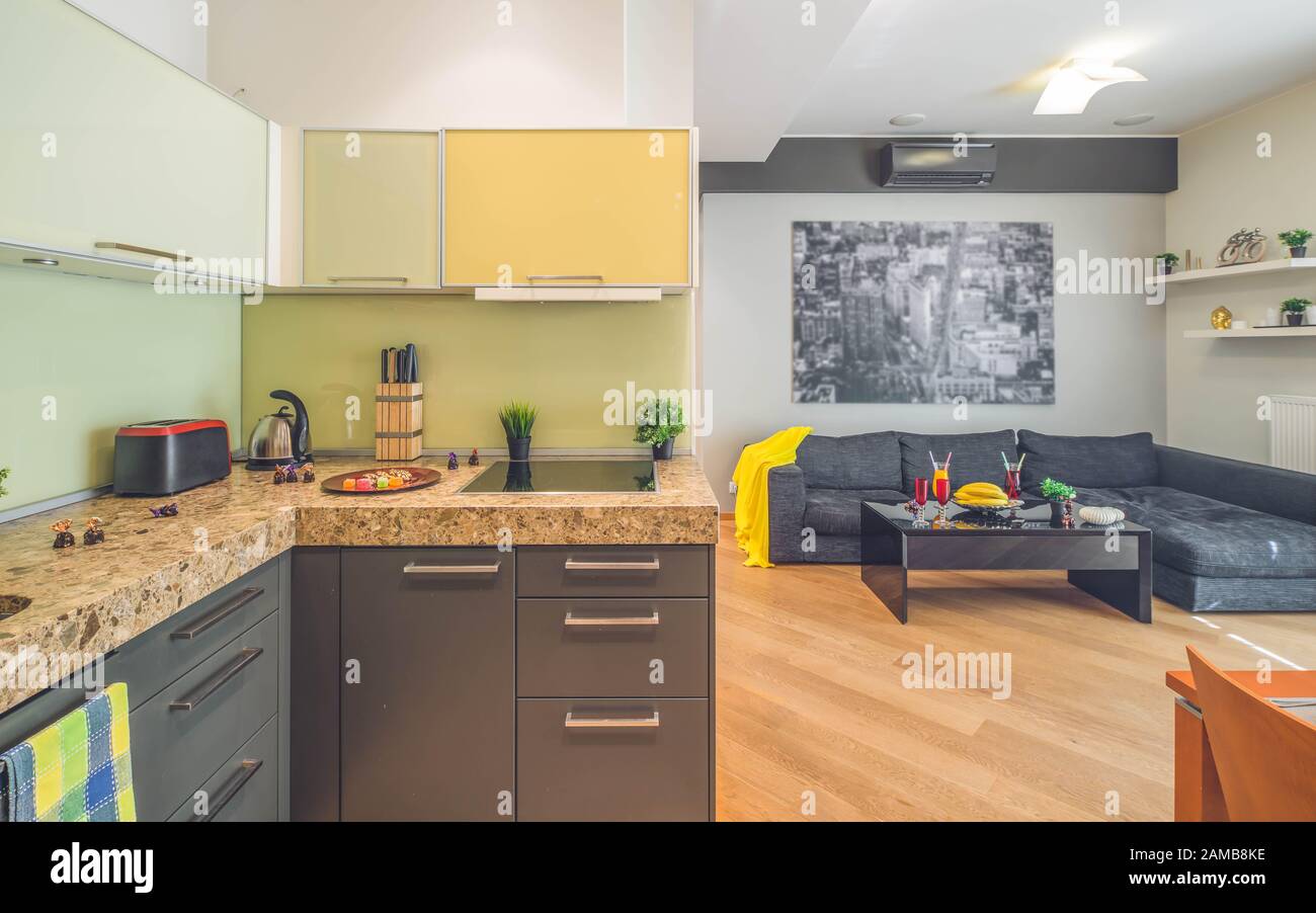 Modern interior of studio apartment with furniture. Living room. Kitchen set Stock Photo Alamy