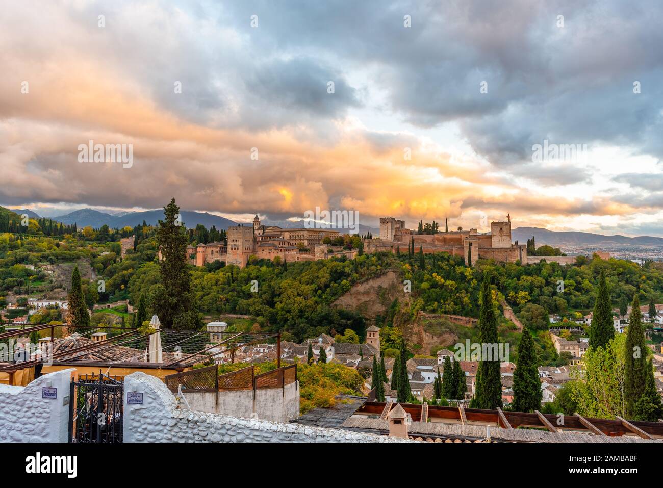 Granada, Spain - November 04, 2019. Palace of Alhambra during sunset seen from mirador san nicolas. Stock Photo
