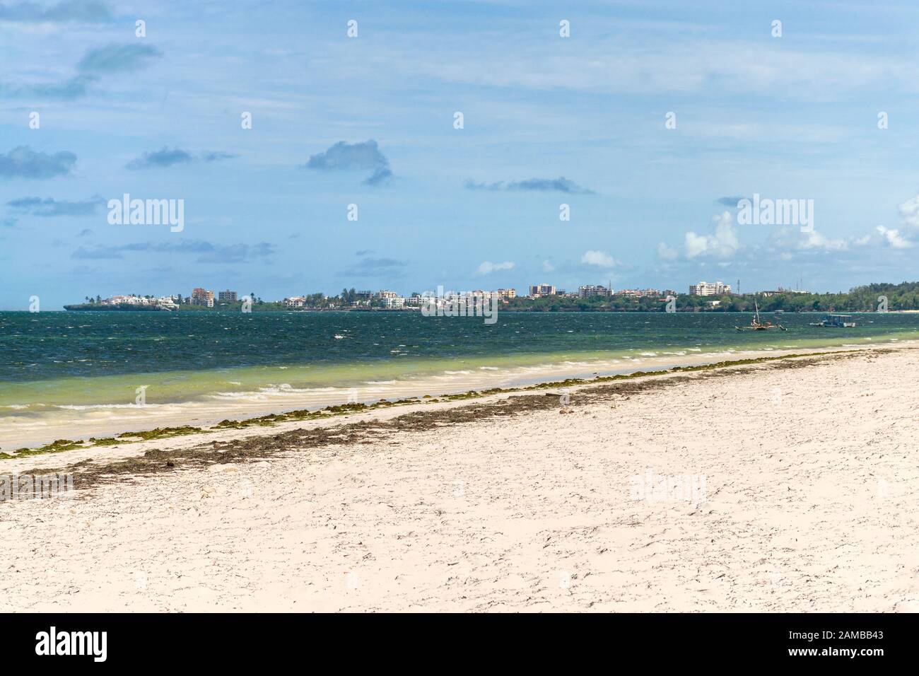 Mombasa skyline as seen from the tropical Shanzu beach, Kenya Stock Photo