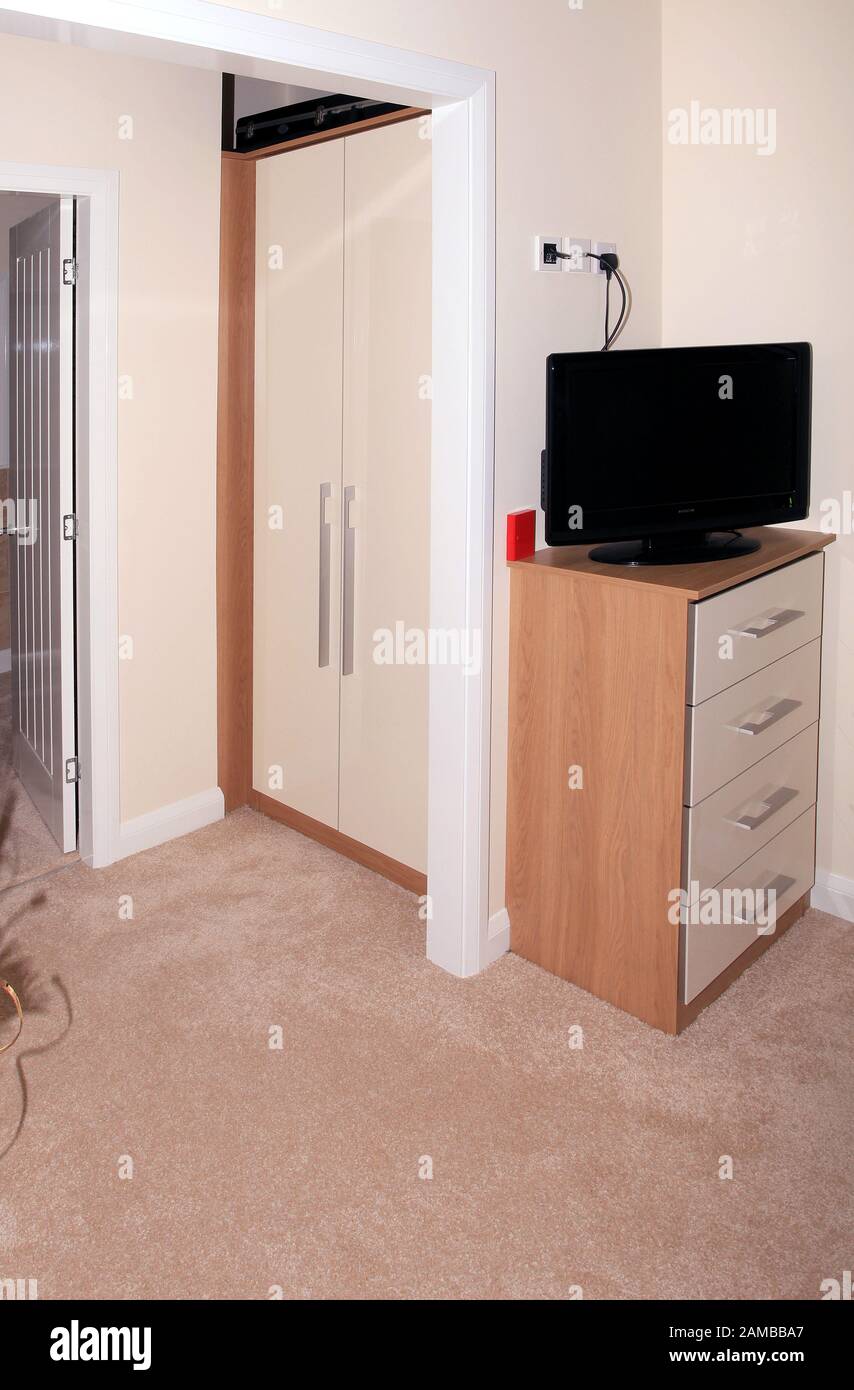 Luxury Interior Bedroom Of A Log Cabin Style Static Caravan Stock