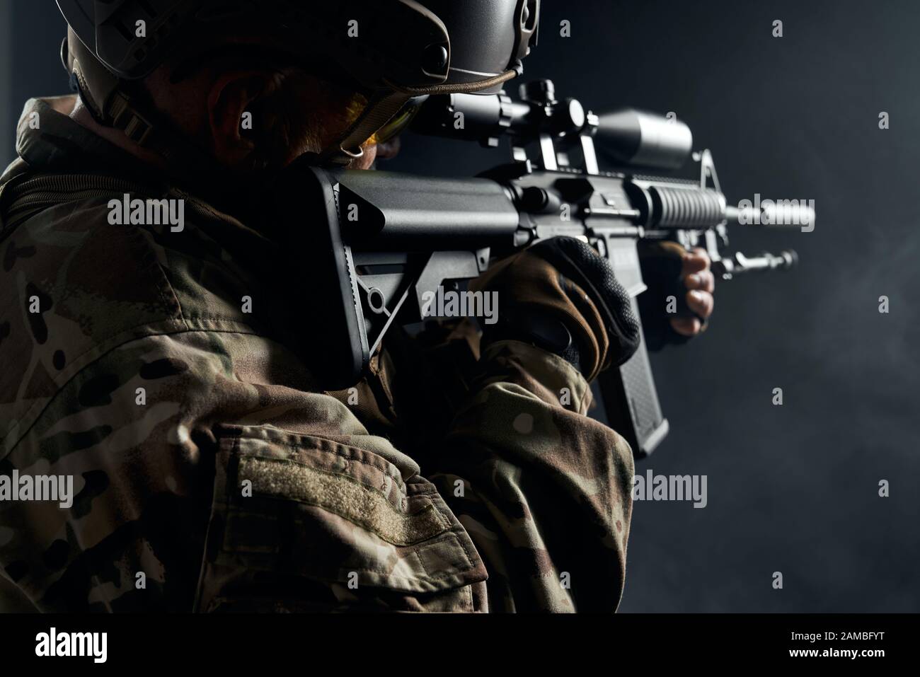Aiming army soldier standing holding rifle hi-res stock photography and ...