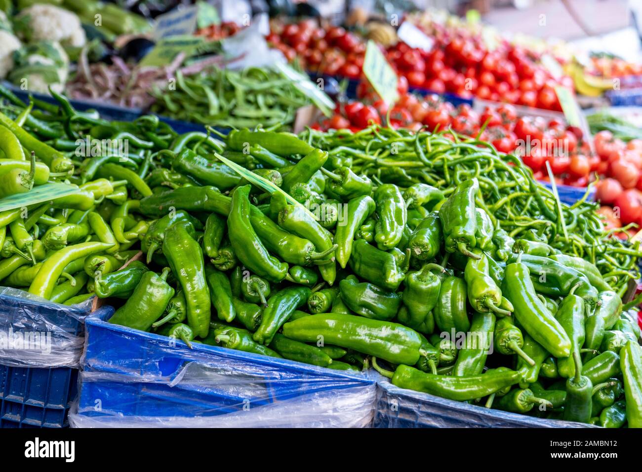 Fresh vegetable green pepper from a pile in a grocery Stock Photo