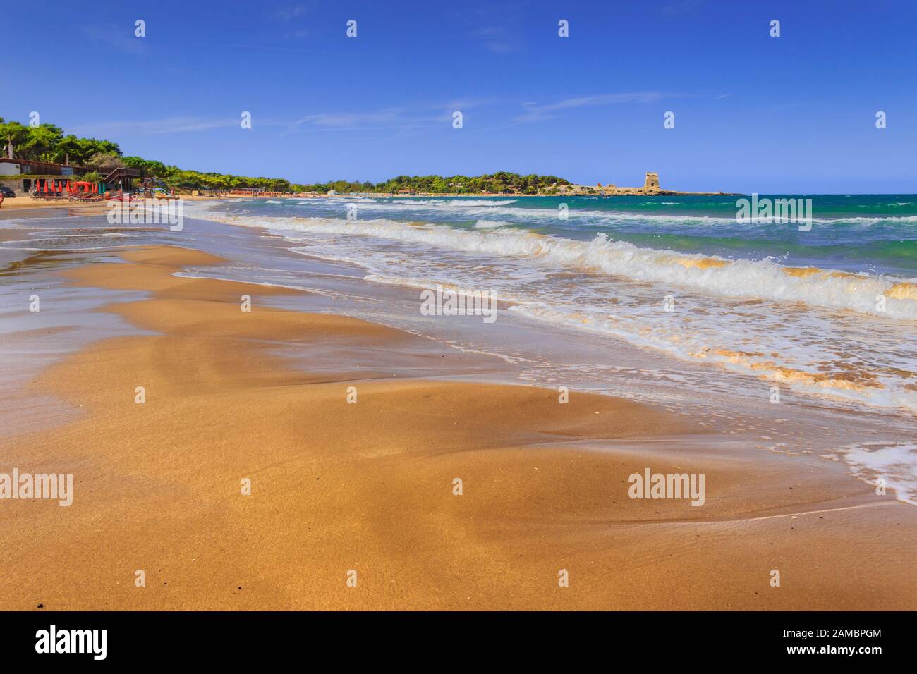 Apulia beach: Bay of Sfinale, surrounded by thick Mediterranean scrub, marks the border between Peschici and Vieste. Stock Photo