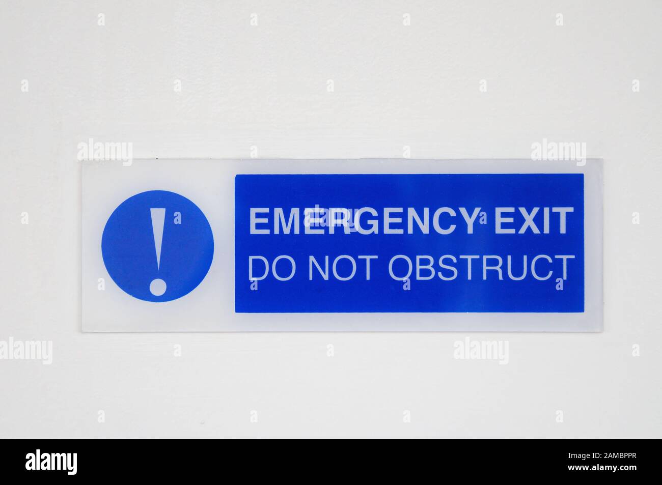 Sign on a door - Emergency Exit Do Not Obstruct Stock Photo