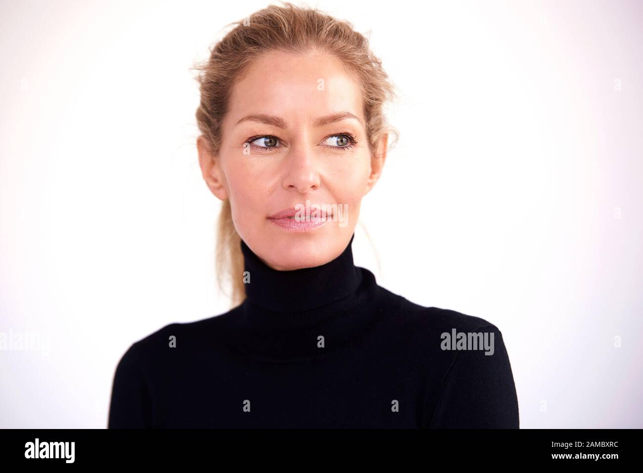 Blond mature woman thinking hi-res stock photography and images - Alamy
