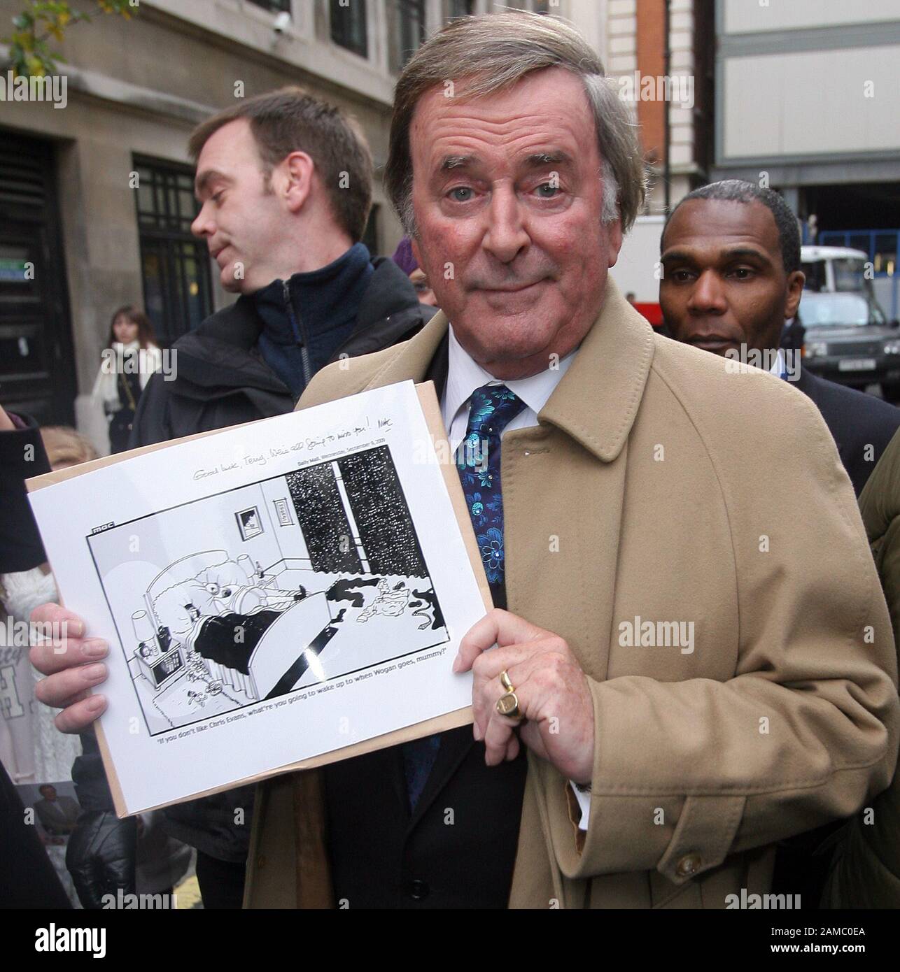 Top radio presenter Sir Terry Wogan departs broadcasting house in