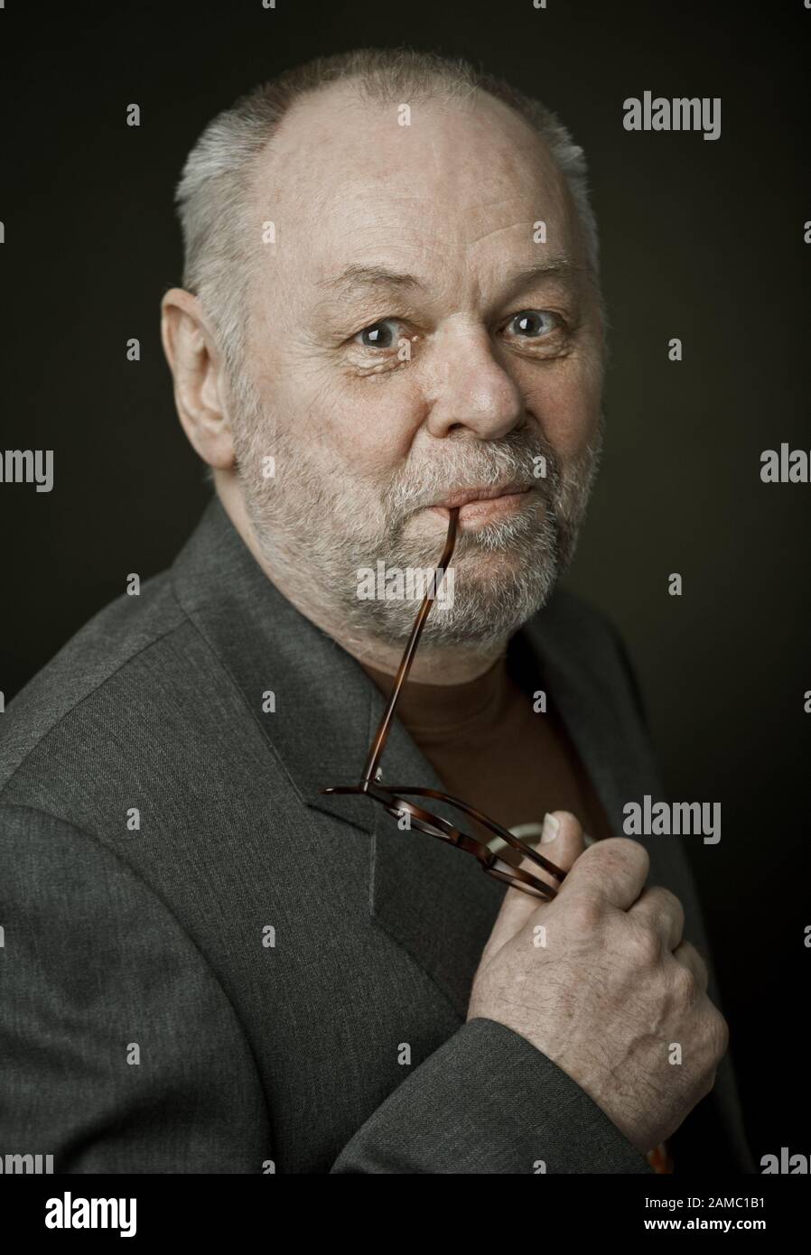 Older man with glasses and beard Stock Photo