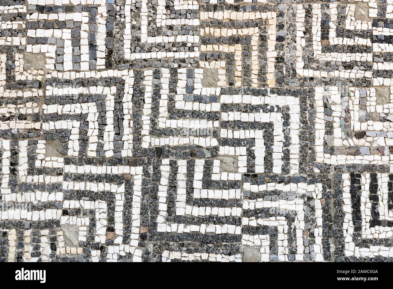 Geometric mosaic made from stone. Antique pattern Stock Photo - Alamy