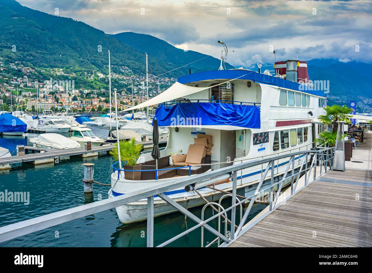 Ristorante Balena on a boat moored in Locarno Harbour on the Lago Maggiore  in Switzerland Stock Photo - Alamy