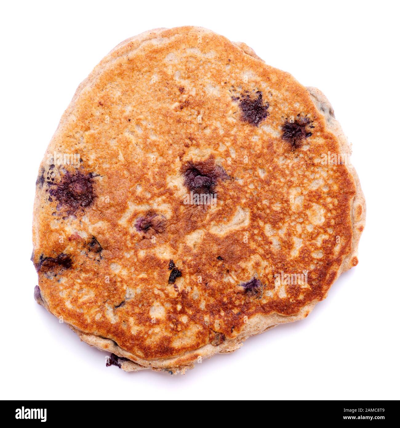 Single blueberry pancake isolated on white background. Stock Photo