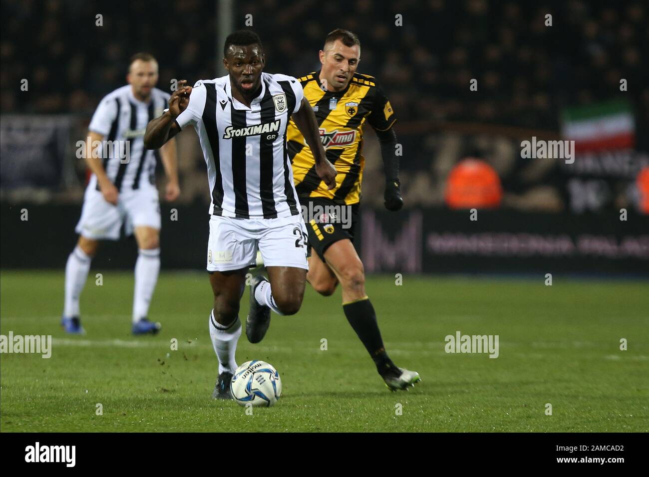 Thessaloniki, Greece. 12th Jan, 2020. PAOK FC player Anderson Esiti (L)  runs with the ball. Classic derby for the Greek Soccer Superleague between  PAOK FC and AEK FC in Toumba Stadium. Credit: