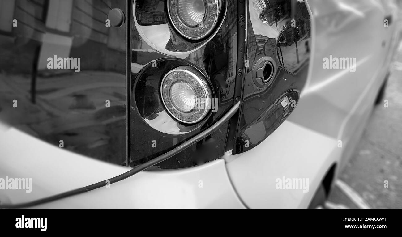 Electric vehicle charging system installed on the street. Station for