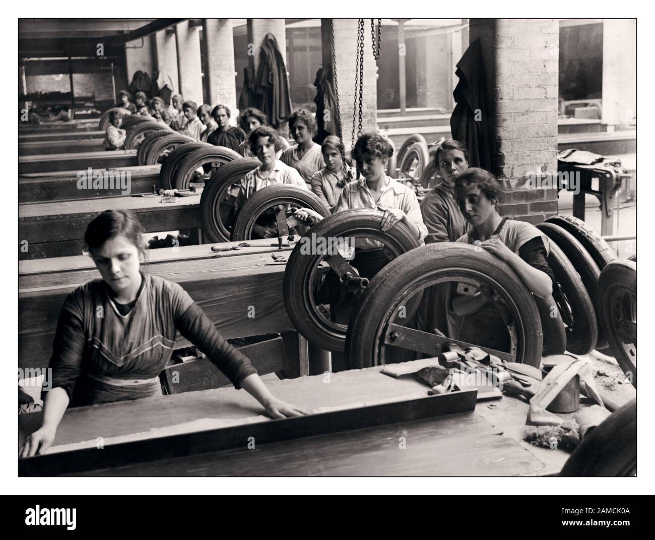 Vintage WW1 World War 1 War work effort, employment of women in Britain, 1914-1918 Female workers in a rubber tyre factory in Lancashire, September 1918. (First World War) Stock Photo