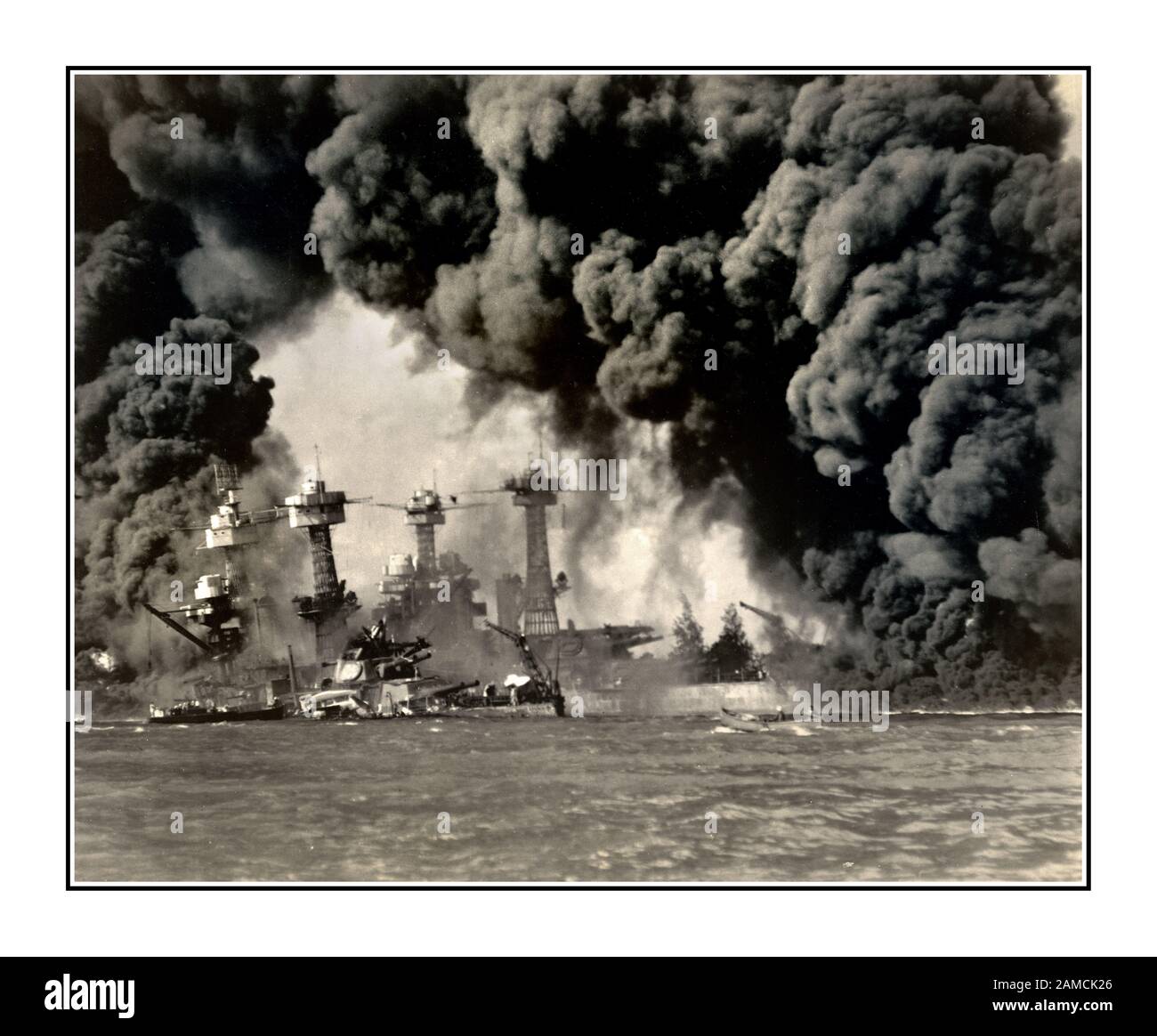 WW2 Pearl Harbor attack 7th December 1941 Japanese surprise air raid on US Navy. U.S.S. West Virginia, U.S.S. Tennessee, U.S.S. Arizona, attacked and terminally damaged Hawaii Japanese attack Pearl Harbor US Navy World War II Naval Operating Base, Pearl Harbor, Oahu, Hawaii USA, Stock Photo