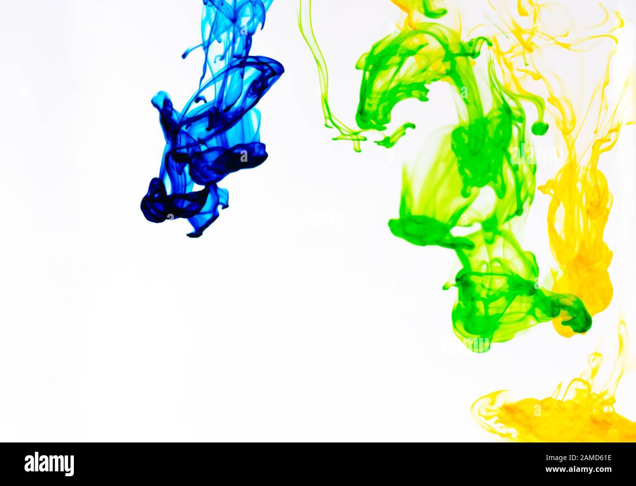 Food color drop and dissolve in water for abstract and background Stock