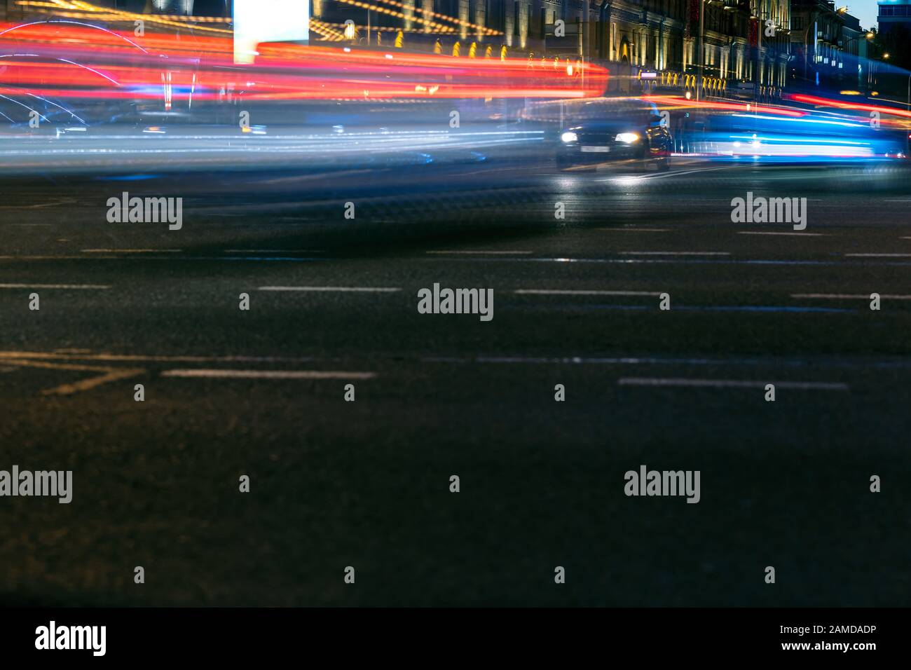 blurred traffic lights at night, long exposure image Stock Photo