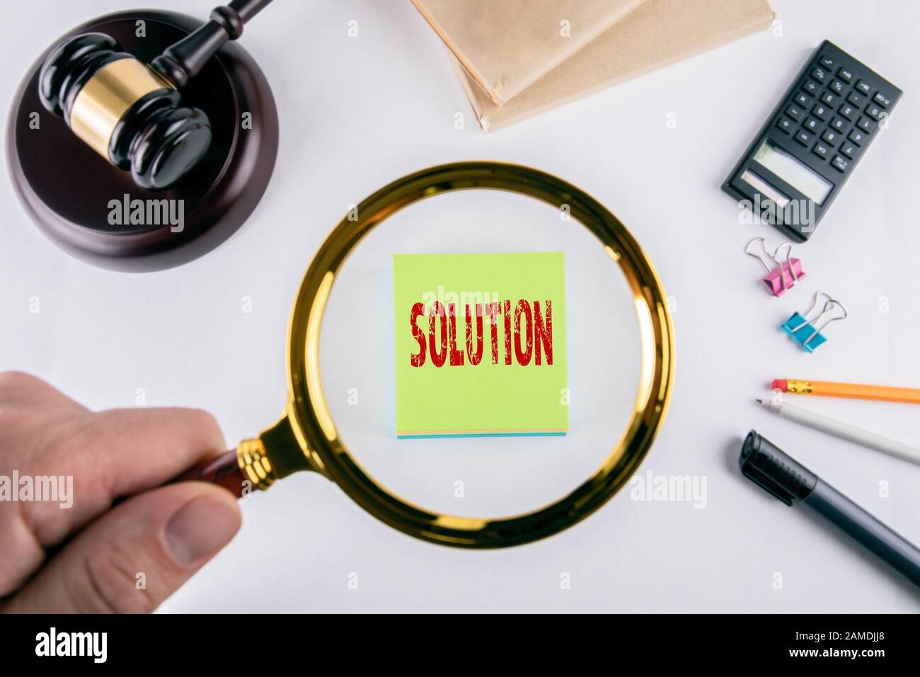 Solution. Law, Justice and legal services concept. Man's hand, holding