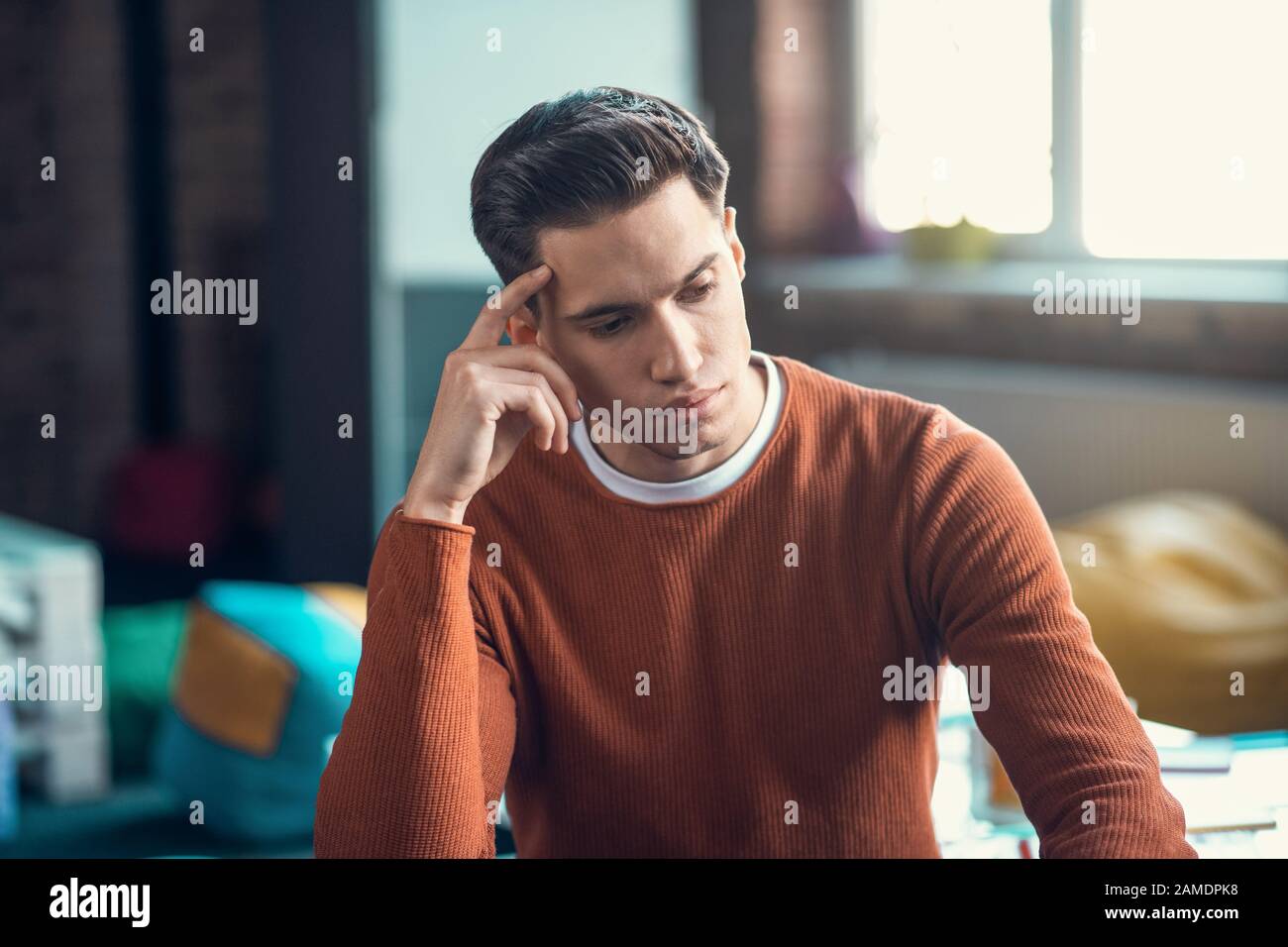 Freelancer feeling overloaded while having too much tasks and deadline Stock Photo
