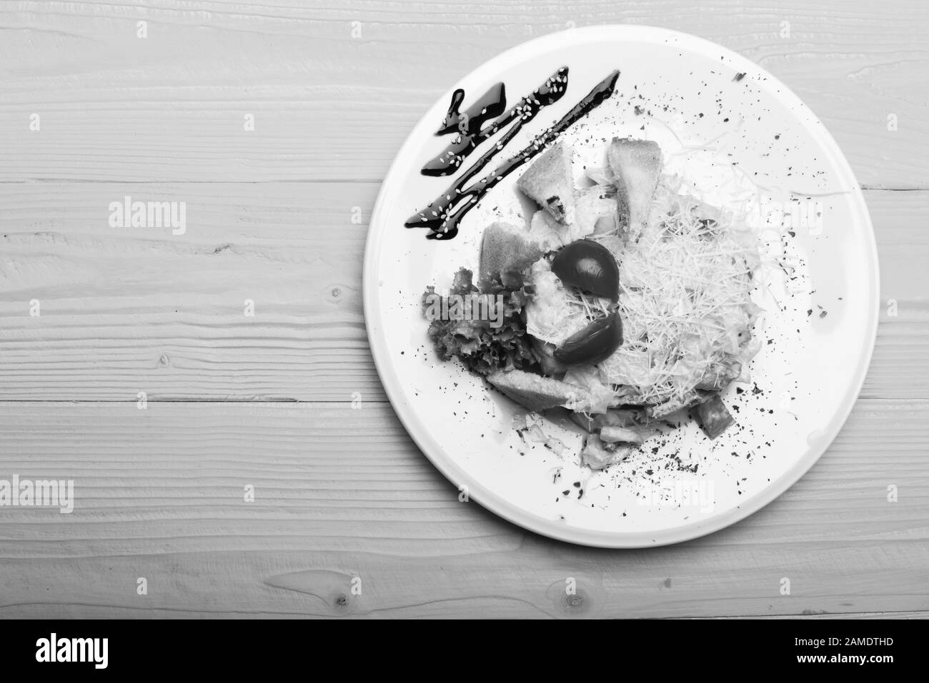 Meat cheese salad on Black and White Stock Photos & Images - Alamy