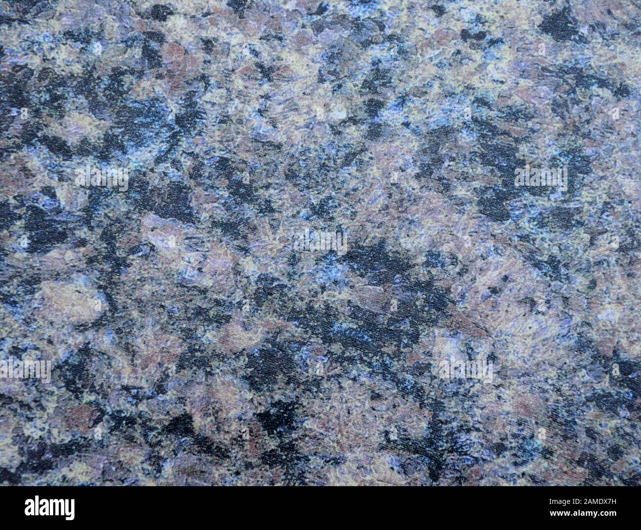 Black granite with brown spots and white veins, beautiful texture of