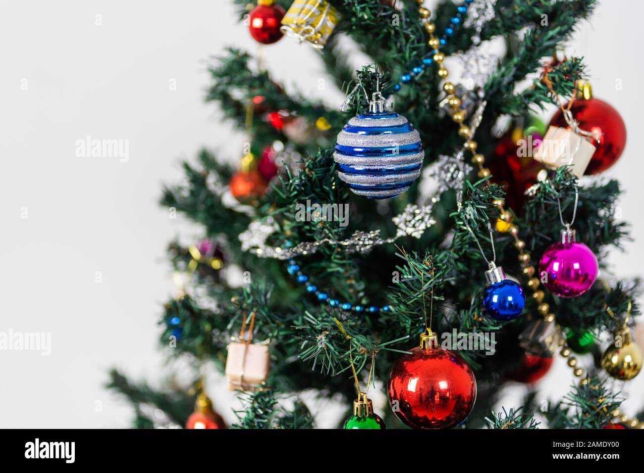 Beautiful christmas tree isolated on white background Stock Photo - Alamy