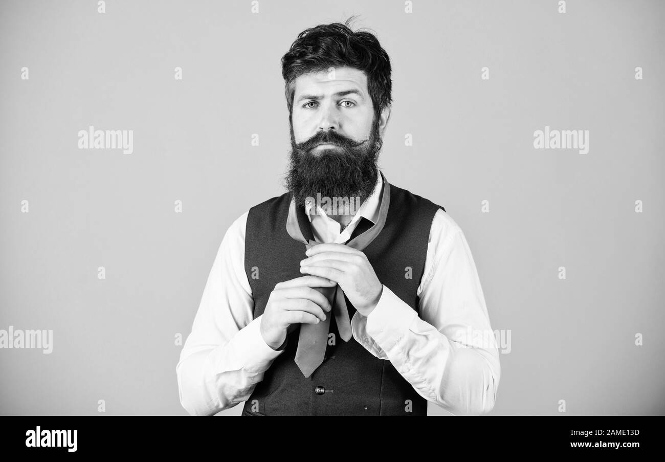 How to tie necktie. Start with your collar up and the tie around your