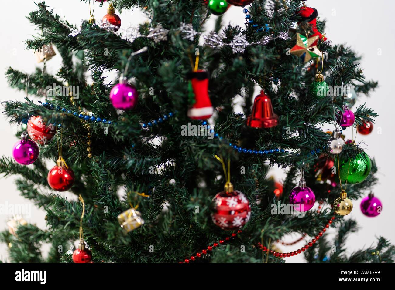 Beautiful christmas tree isolated on white background Stock Photo - Alamy
