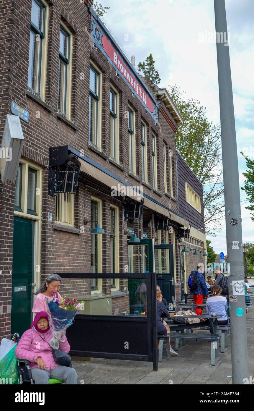 Amsterdam, Holland, August 2019. The Brouwerij't IJ brewery is housed in a mill which retains