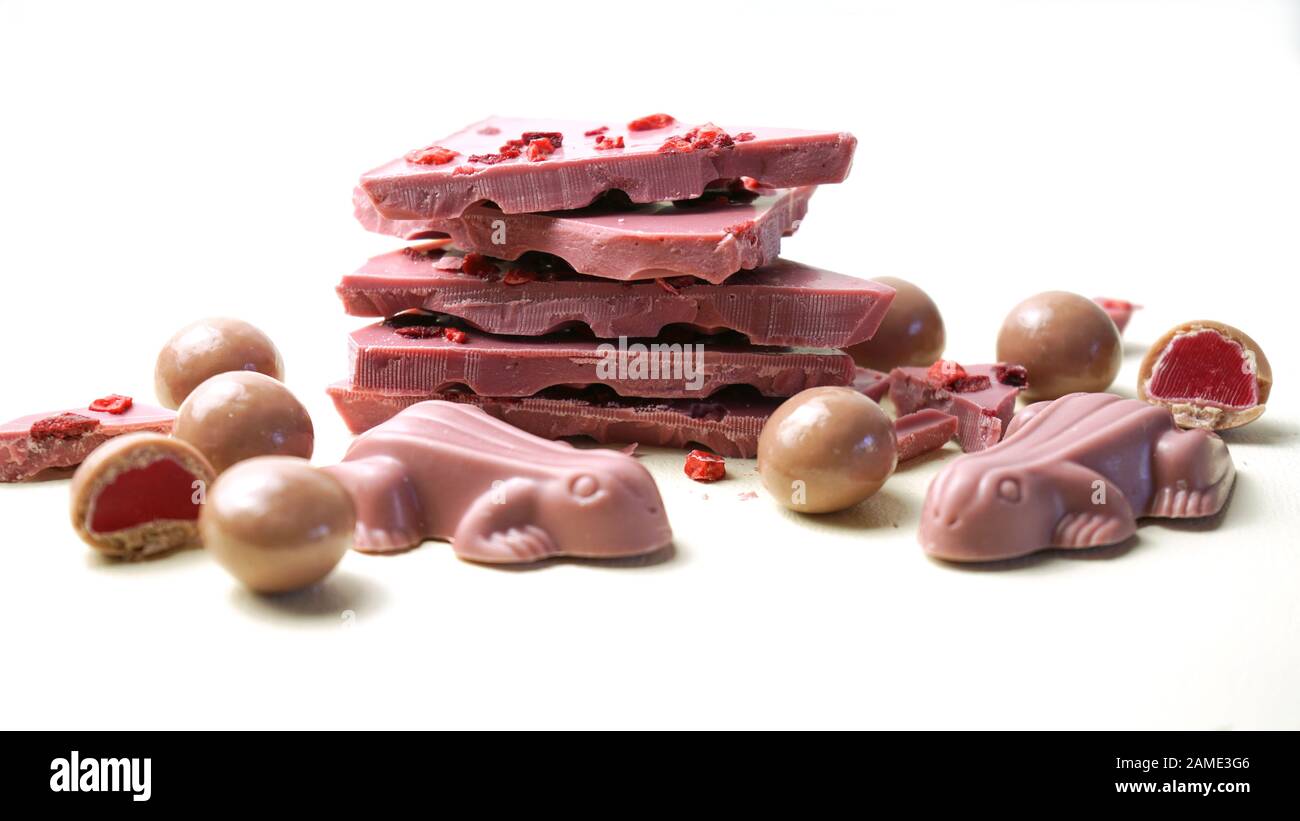 Ruby chocolate selection, made botanical cocoa bean varieties that have the right attributes to be processed into ruby chocolate, from the macro close Stock Photo