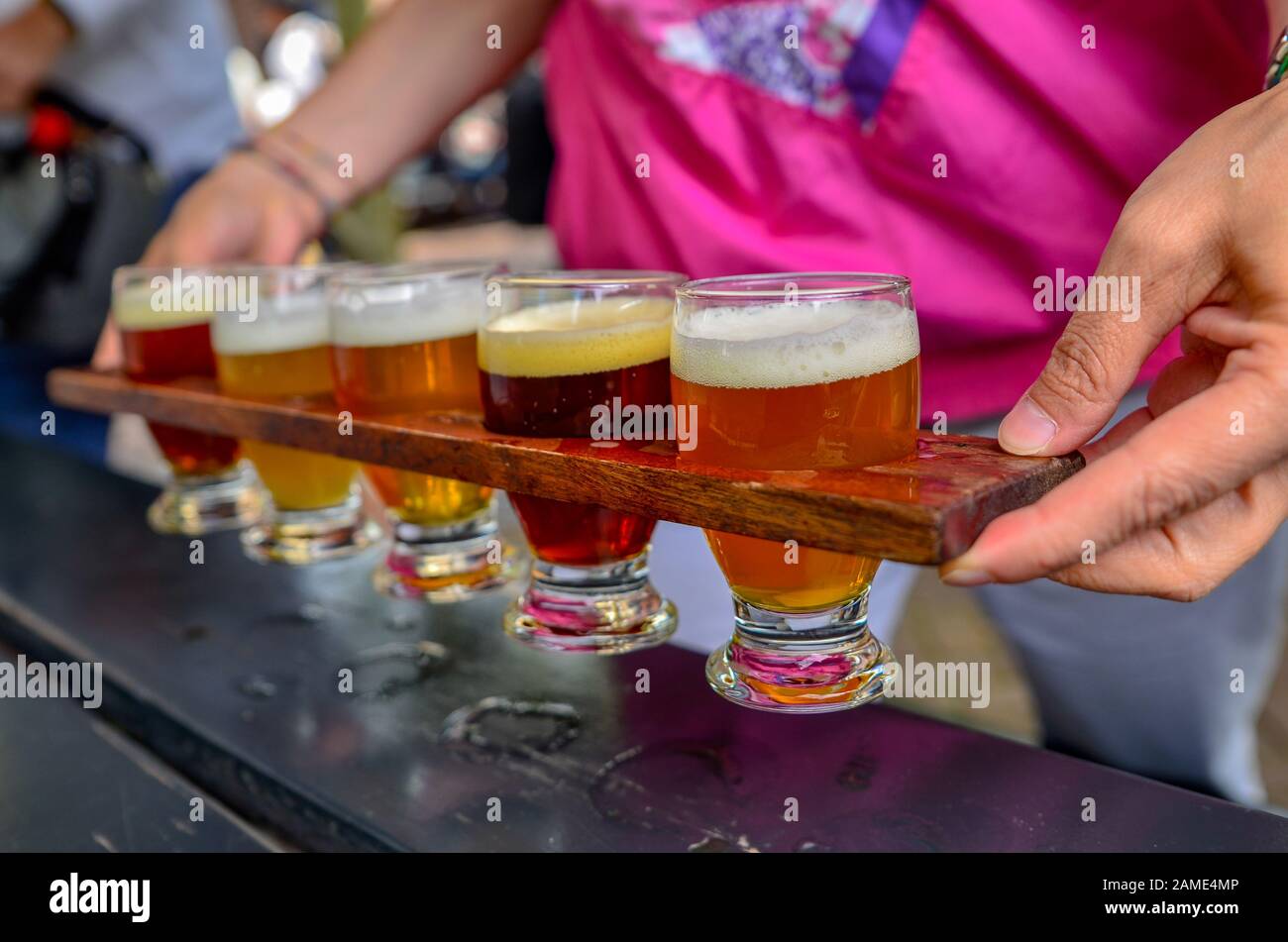 Craft beer tasting five glasses with beers of different colors and