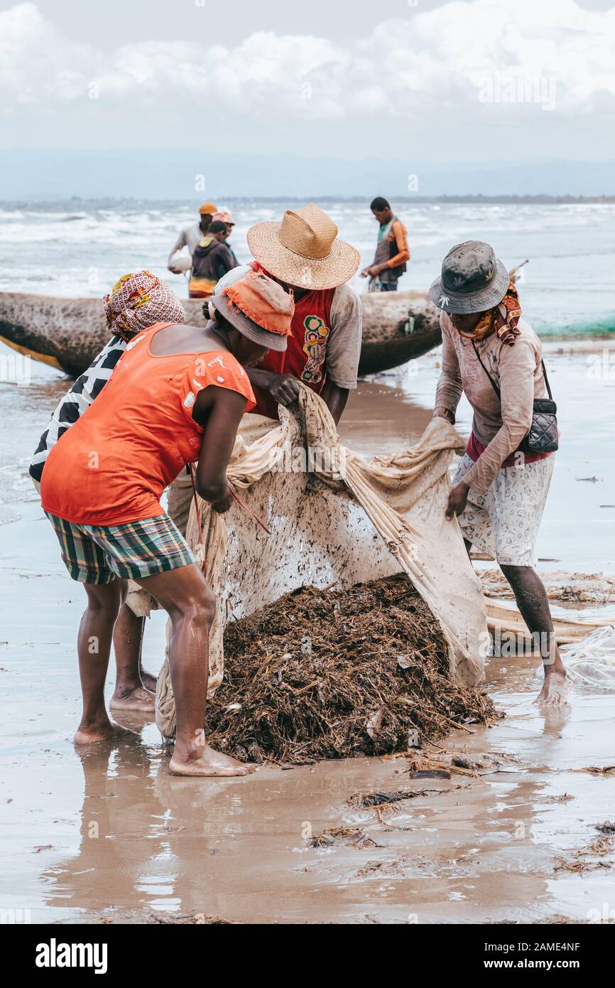 MAROANTSETRA, MADAGASCAR OCTOBER 19.2016: Native woman sort catch on