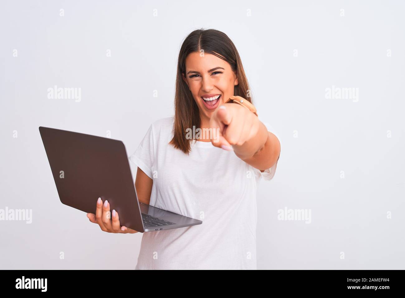 Beautiful young woman working using computer laptop over white ...