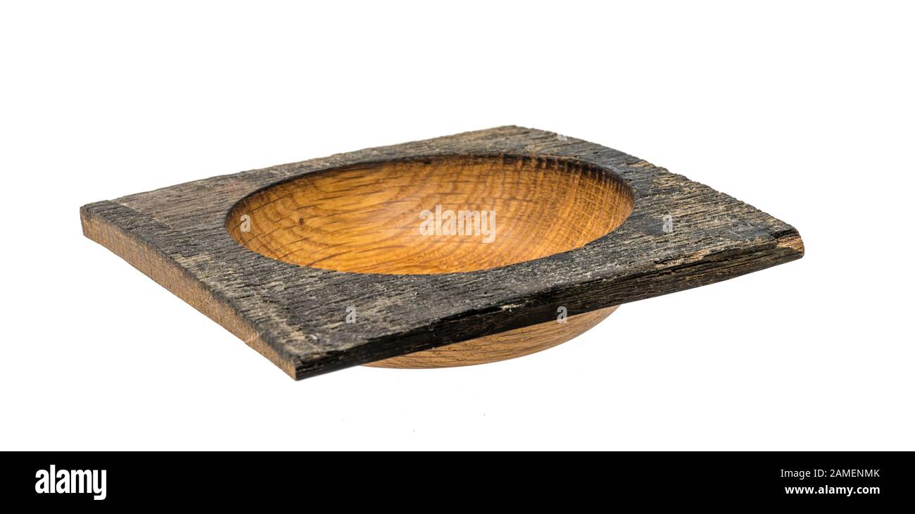 Hand-turned dark oak wooden bowl in square shape isolated on white Stock Photo