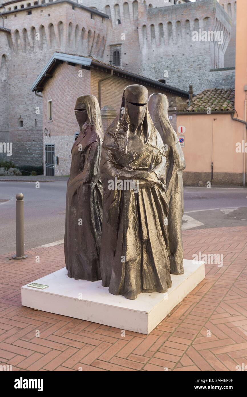 Oranti, sculpture representing a group of three muslim women wearing