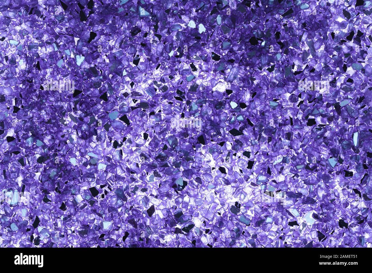 Abstract background of close up detail of fragments of purple crushed