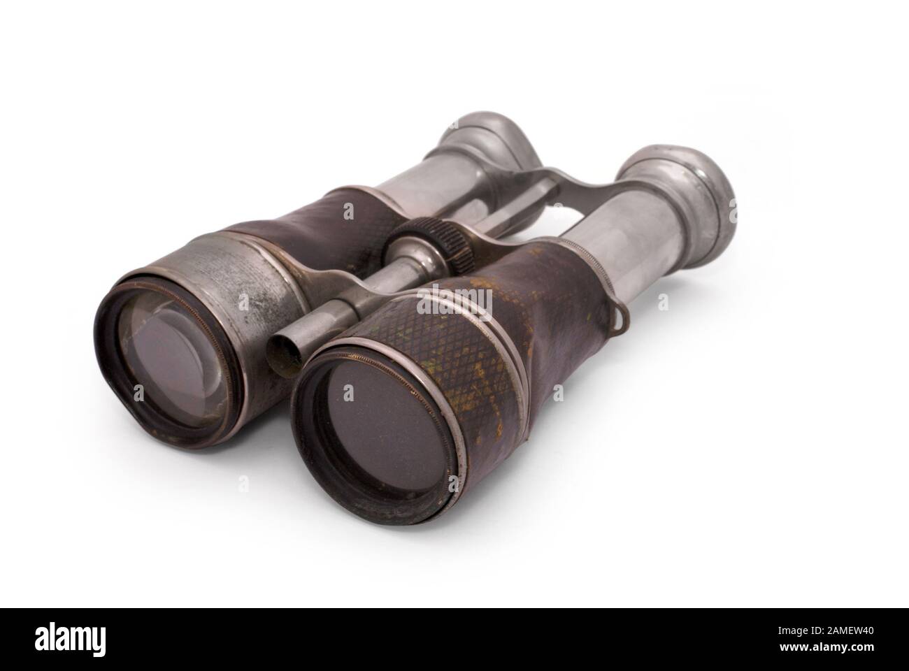 French binocular of 19 century with leather box. Was popular both by French civilian and the military. With path on black background. Used in WWI. Stock Photo