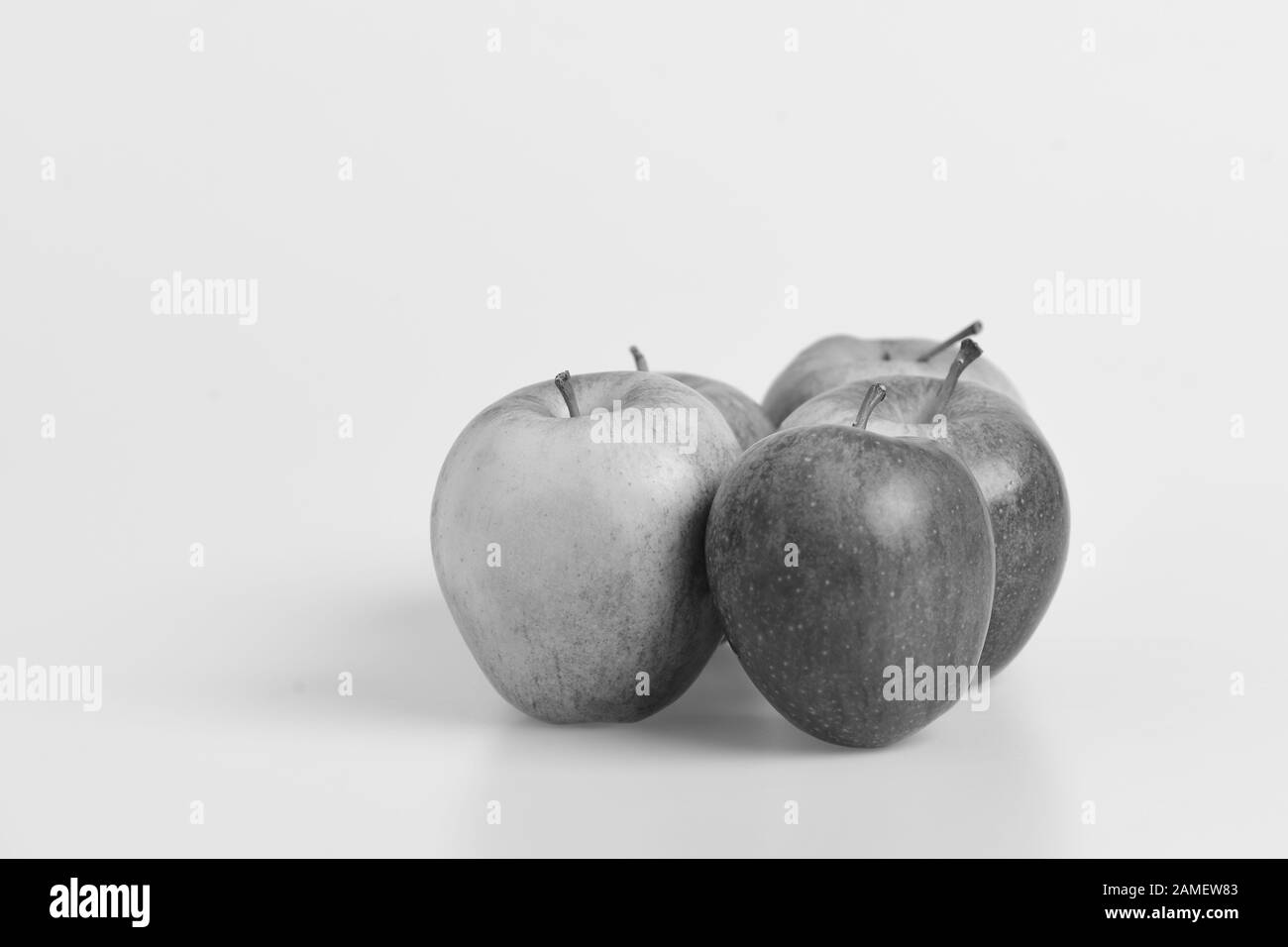 Fruit quintet with copy space. Apple fruits on light grey background