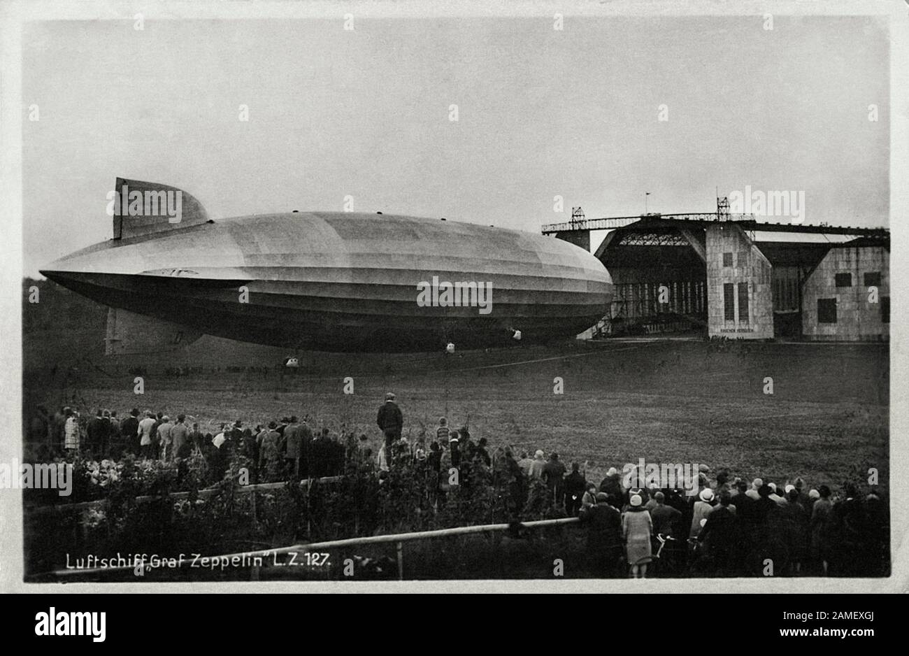 The queue of passengers waiting to board the airship LZ 127 Graf Zeppelin. 1930-s Stock Photo