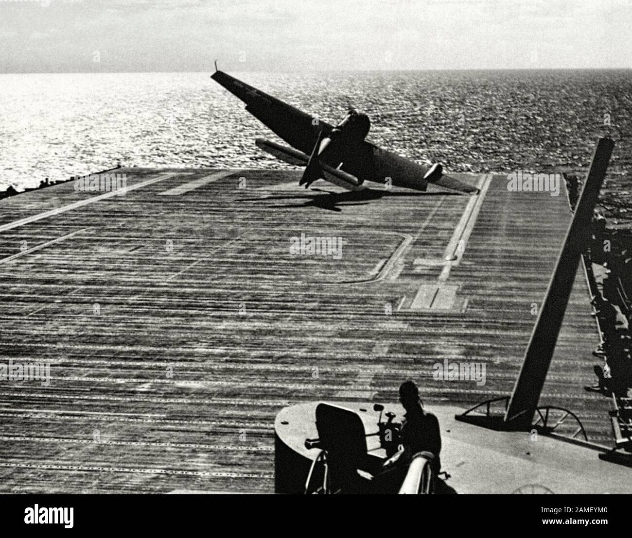 The photo shows the unsuccessful test take-off of the Grumman TBF Avenger torpedo bomber from desk of the Ticonderoga aircraft carrier. Pacific. July Stock Photo