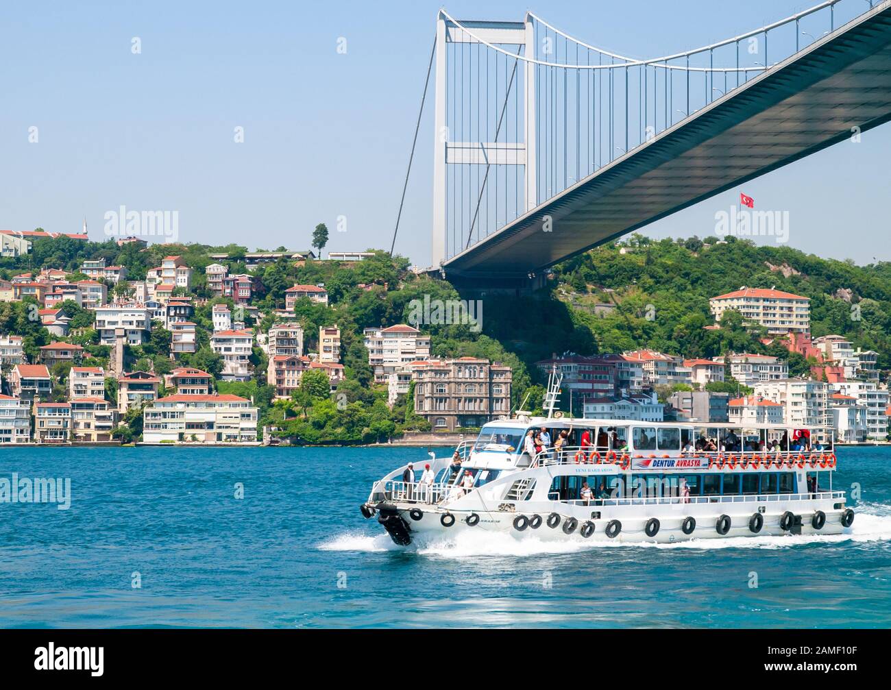 Istanbul / Turkey - Touristic cruise ship with passengers at Bosporus ...