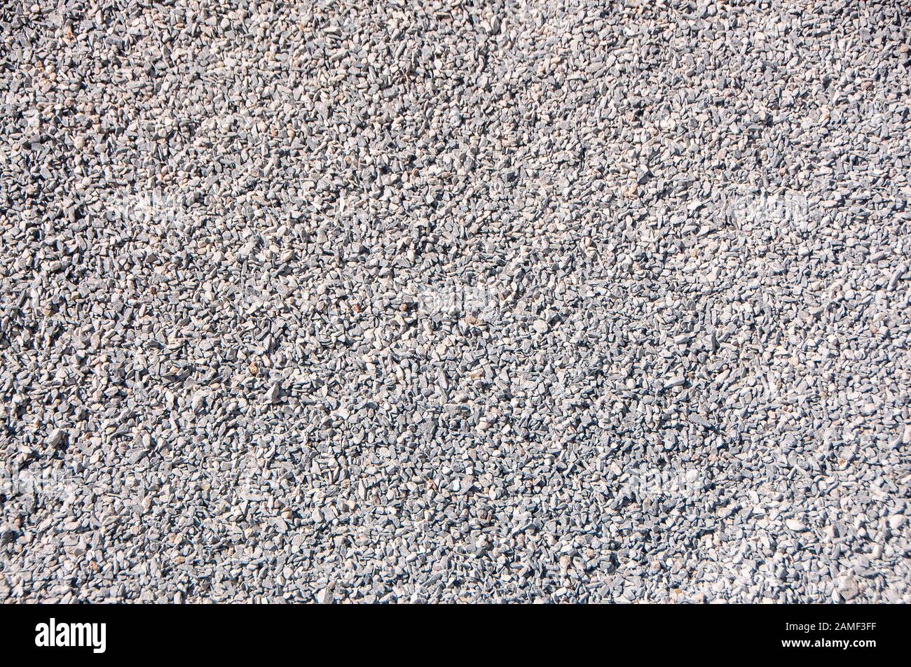 Fine gravel stone texture background for construction cement mixing. Stock Photo