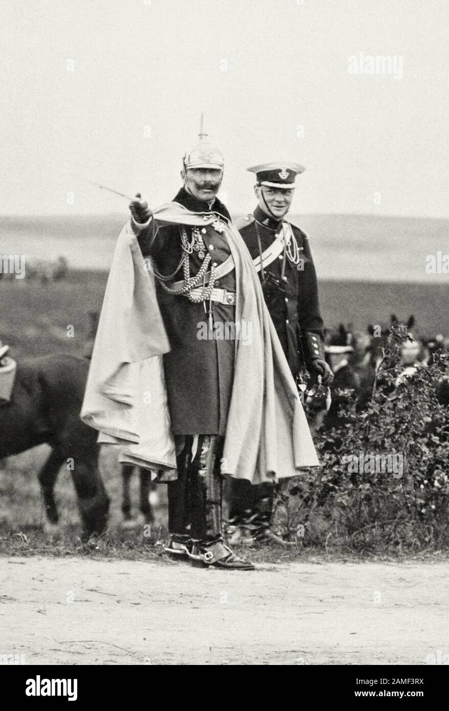 Kaiser Wilhelm II points out an event of interest to the British Junior Minister at the Colonial Office, Winston Churchill, during the summer manoeuvr Stock Photo