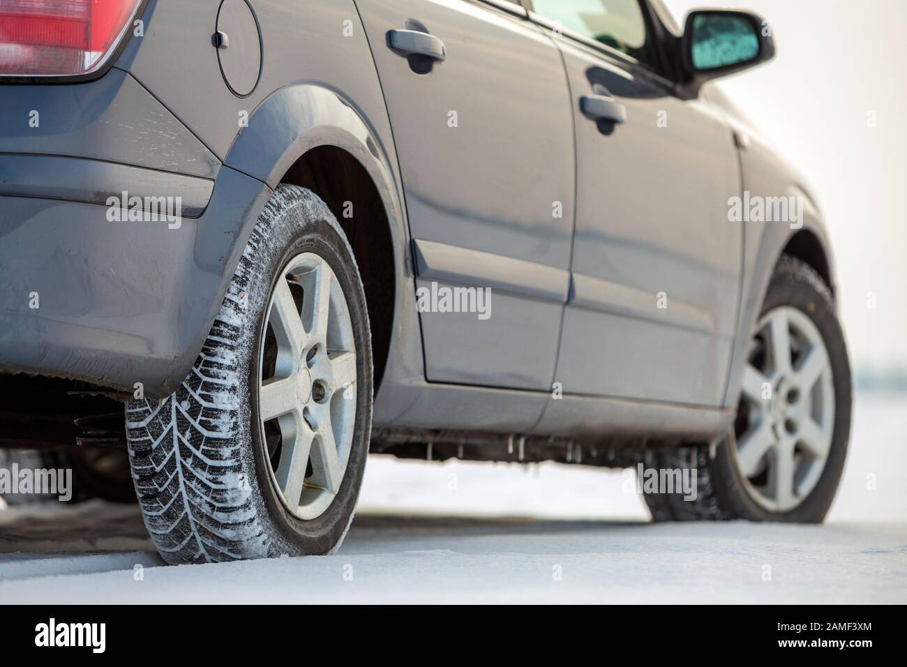 Car parked on snowy road on winter day. Transportation, vehicles design ...