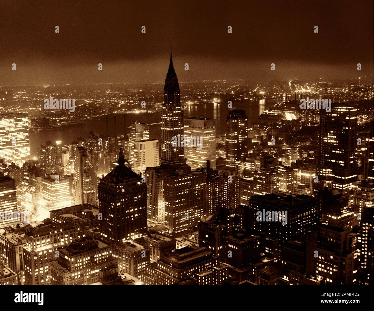 Manhattan at night. New York, USA.  December 1957 Stock Photo