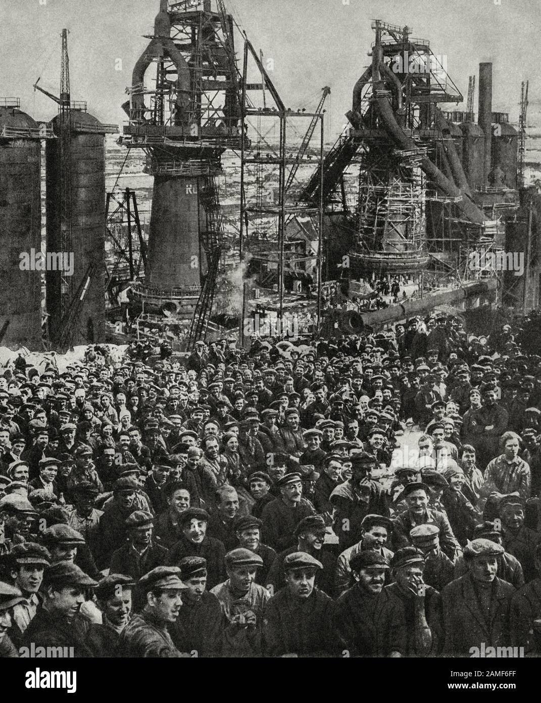 The life in Soviet Union in 1930s. From soviet propaganda book. Photo: Ceremonial meeting at Magnitogorsk, after finishing work at the Kabakov ore min Stock Photo